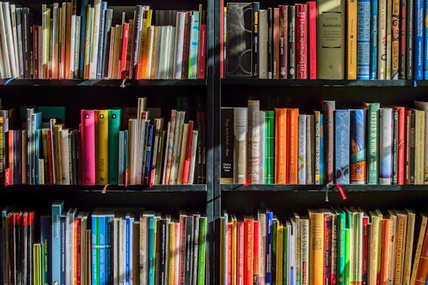 A stack of books that inspired GadZeke